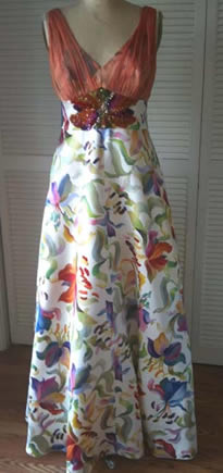 Italian handpainted silk was encrusted with colorful crystals through thte midriff
