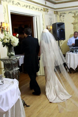 Vintage Style headpiece and veil featured rouching over the crown of the cap and a detachable cathedral veil.